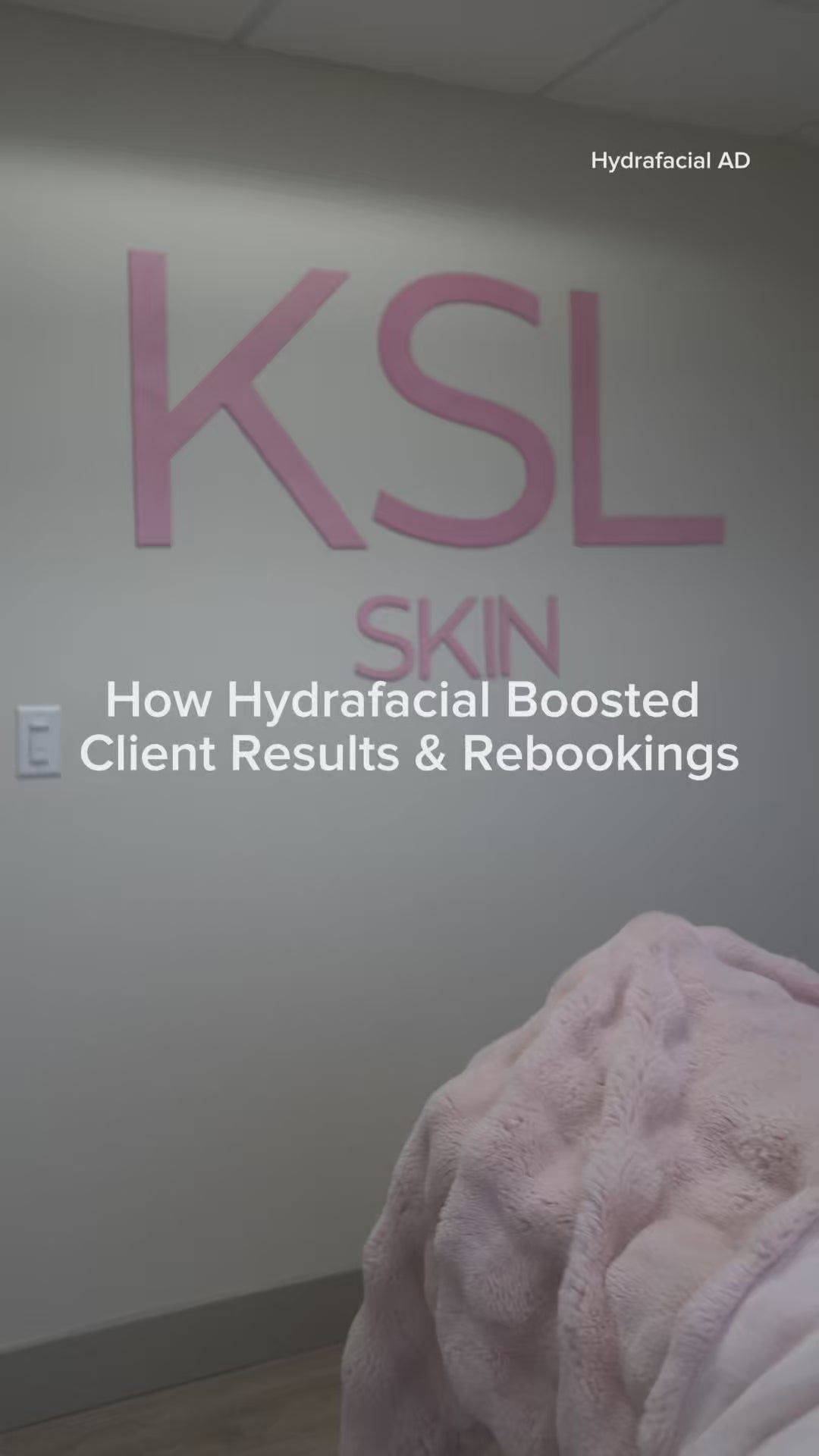 Interior of a skincare clinic with large pink letters reading “KSL SKIN” on the wall. Text overlay on the image reads: “How Hydrafacial Boosted Client Results & Rebookings.”